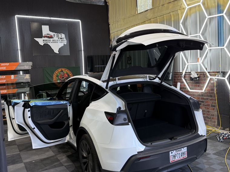 Tesla Model Y mid-install at PMT Tint El Paso